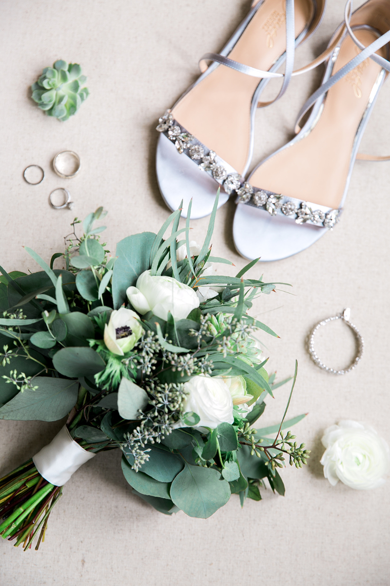 greenery bouquet with silver wedding shoes